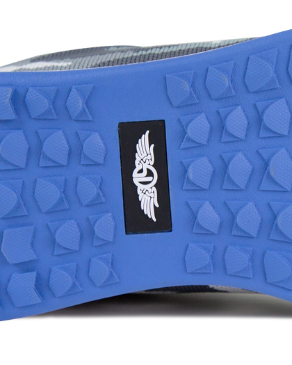 Men's Field V2 Shoe in Camo Carbon, close-up outsole detail view featuring the blue traction outsole and black SD logo label