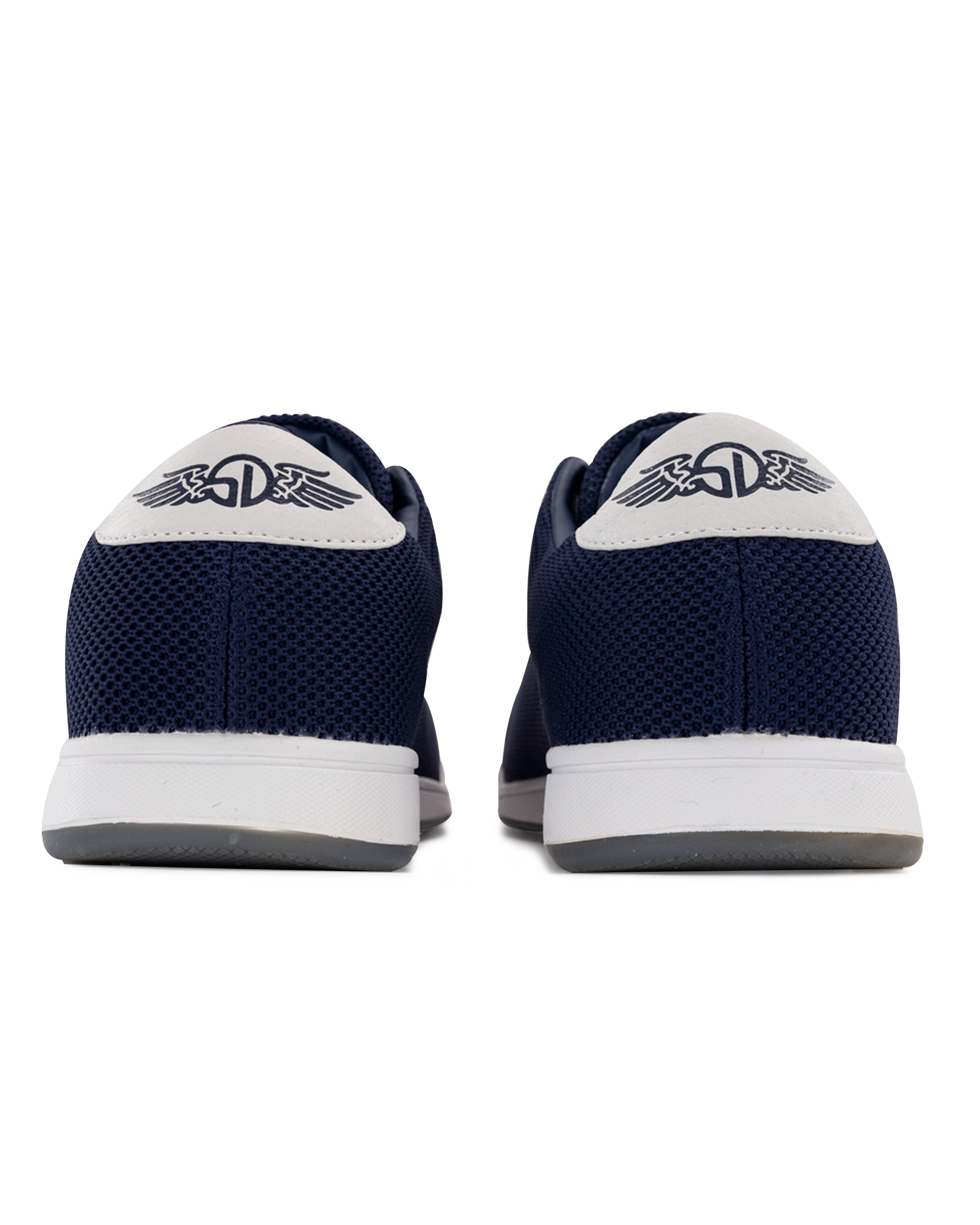 Men's Field V2 Shoe in Indigo, heel view featuring the navy mesh knit upper, white heel tab with SD wing logo, and white midsole