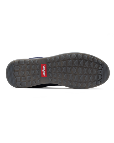 Men's Field V2 Shoe in Indigo, bottom view featuring a gray traction outsole with a red SD logo label