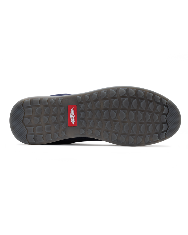 Men's Field V2 Shoe in Indigo, bottom view featuring a gray traction outsole with a red SD logo label