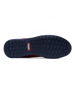 Men's Field V2 Shoe in Red, bottom sole view featuring a navy rubber outsole with multi-directional traction lugs and a branded logo badge