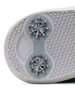 Close-up of the sole of a golf shoe, showing dual metallic cleats on a textured white and light gray outsole.