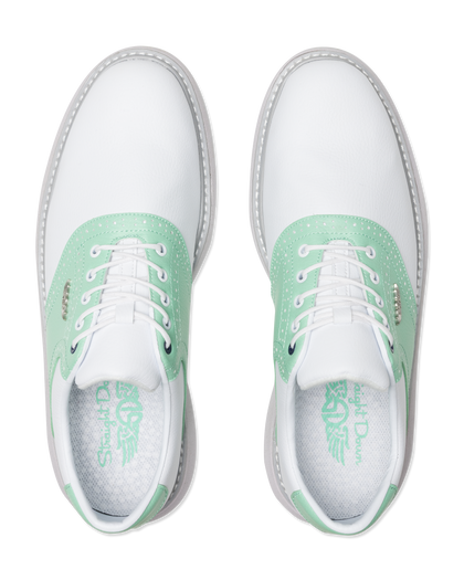 A pair of white leather golf shoes with green suede overlays and white laces, shown from a top-down view on a white background.