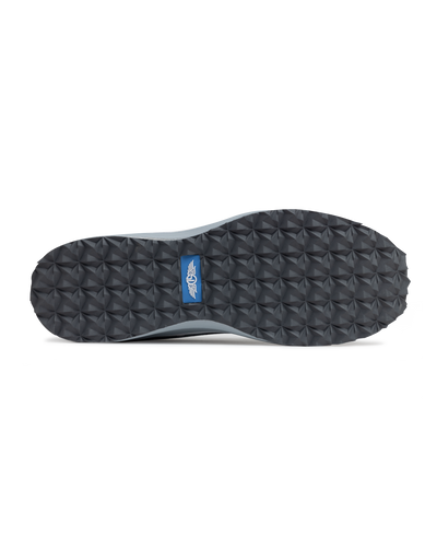 Straight Down Mojave Shoe in Camo Carbon, bottom view featuring a dark grey geometric textured outsole with Straight Down logo tab in blue
