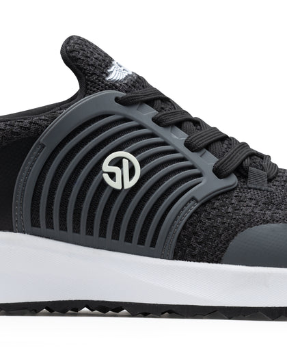 Men's Moonlight Shoe in Charcoal, close up side view featuring a black and charcoal knit upper with charcoal overlays, charcoal ribbed midfoot support cage with SD logo, black laces, a white midsole, and a black outsole