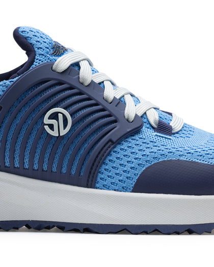 Men's Moonlight Shoe in Scuba, close up side view featuring a light blue knit upper with navy overlays, navy ribbed midfoot support cage with SD logo, white laces, and a white midsole
