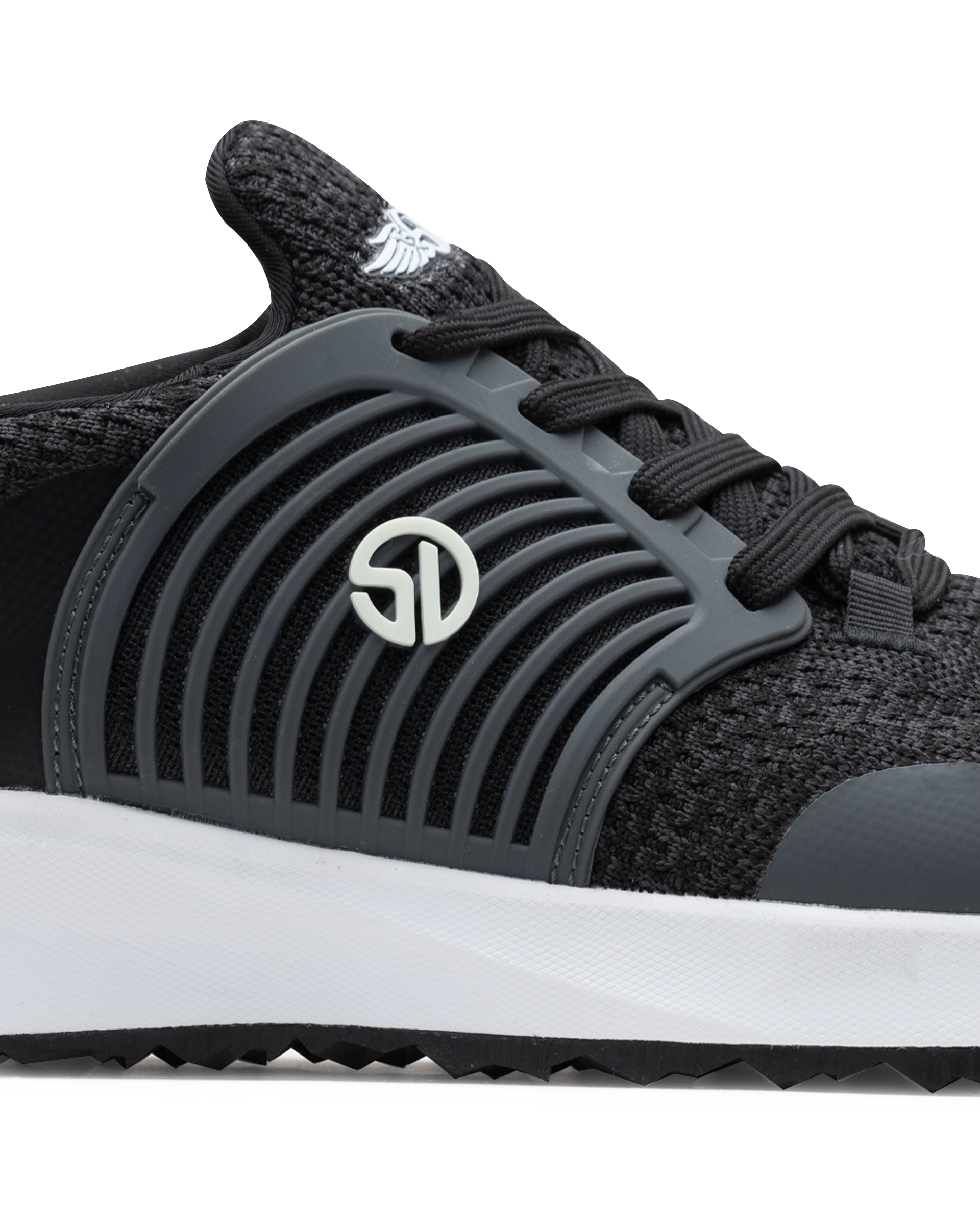 Men's Moonlight Shoe in Charcoal, close up side view featuring a black and charcoal knit upper with charcoal overlays, charcoal ribbed midfoot support cage with SD logo, black laces, a white midsole, and a black outsole