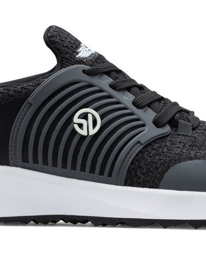 Men's Moonlight Shoe in Charcoal, close up side view featuring a black and charcoal knit upper with charcoal overlays, charcoal ribbed midfoot support cage with SD logo, black laces, a white midsole, and a black outsole