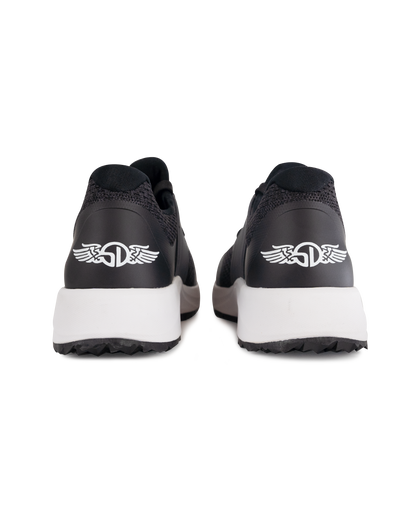 Men's Moonlight Shoe in Charcoal, heel view featuring a black and charcoal knit upper with charcoal overlays, charcoal ribbed midfoot support cage with SD logo, black laces, a white midsole, and a black outsole