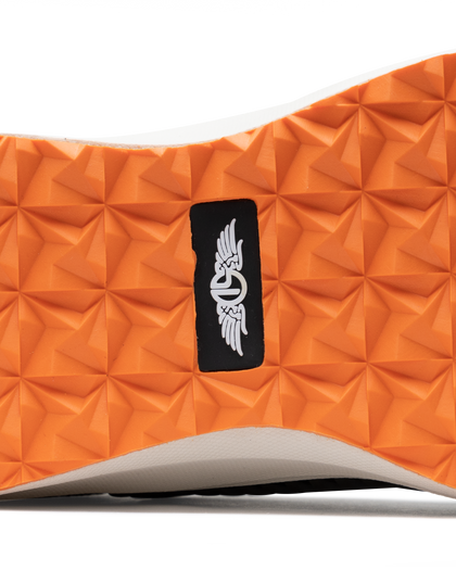 Men's Moonlight Shoe in Olive, close up bottom view featuring a black knit upper with olive overlays, olive ribbed midfoot support cage with SD logo, black laces, a white midsole, and an orange outsole
