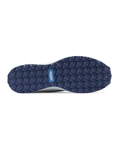 Straight Down Women's Moonlight Shoe in Scuba, bottom view featuring a navy traction outsole with geometric grip pattern and blue Straight Down logo badge at arch