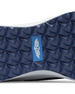 Straight Down Women's Moonlight Shoe in Scuba, close-up bottom view featuring navy traction outsole with geometric grip pattern and blue Straight Down logo badge
