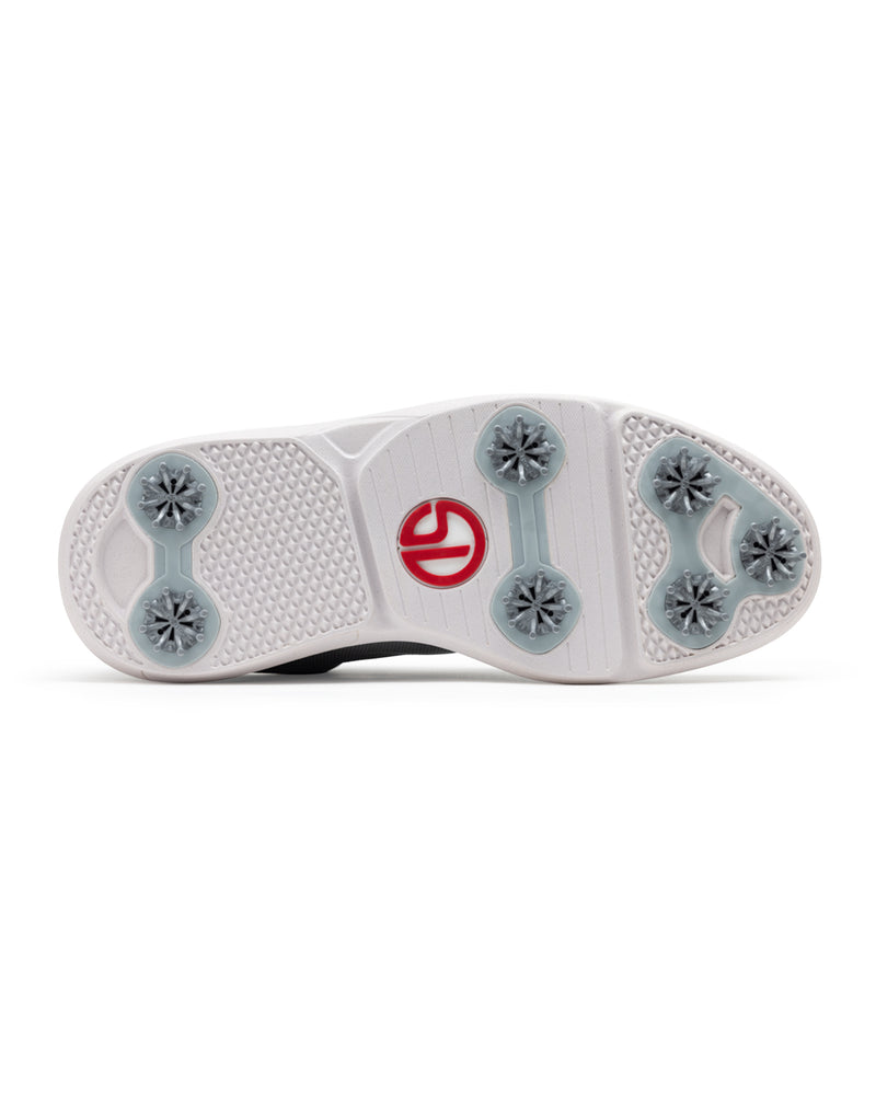 Straight Down Club Golf Shoe in Carbon, bottom view showing white outsole with grey traction cleats and Straight Down logo in red