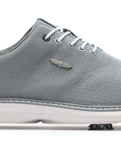 Straight Down Club Golf Shoe in Carbon, close-up side view showing grey knit upper texture, white laces, and silver Straight Down logo detail