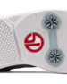 Close-up of a white athletic shoe sole showing a red Straight Down logo and gray spiked outsole details on a white background.