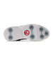 The bottom sole of a golf shoe, featuring a white textured rubber base with gray star-shaped spikes and a red Straight Down logo in the center.
