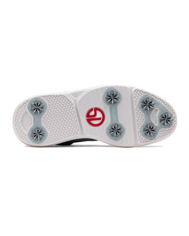 The bottom sole of a golf shoe, featuring a white textured rubber base with gray star-shaped spikes and a red Straight Down logo in the center.