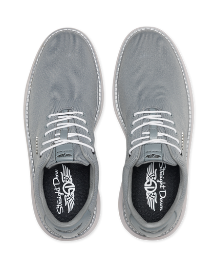 A pair of gray canvas lace-up shoes shown from a top-down view on a white background, featuring white laces and a black insole with the Straight Downs logo.