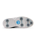 Men's Challenger Shoe in Carbon, bottom sole view featuring a white rubber outsole with gray spike cleats, textured traction zones, and a blue and white branded logo badge