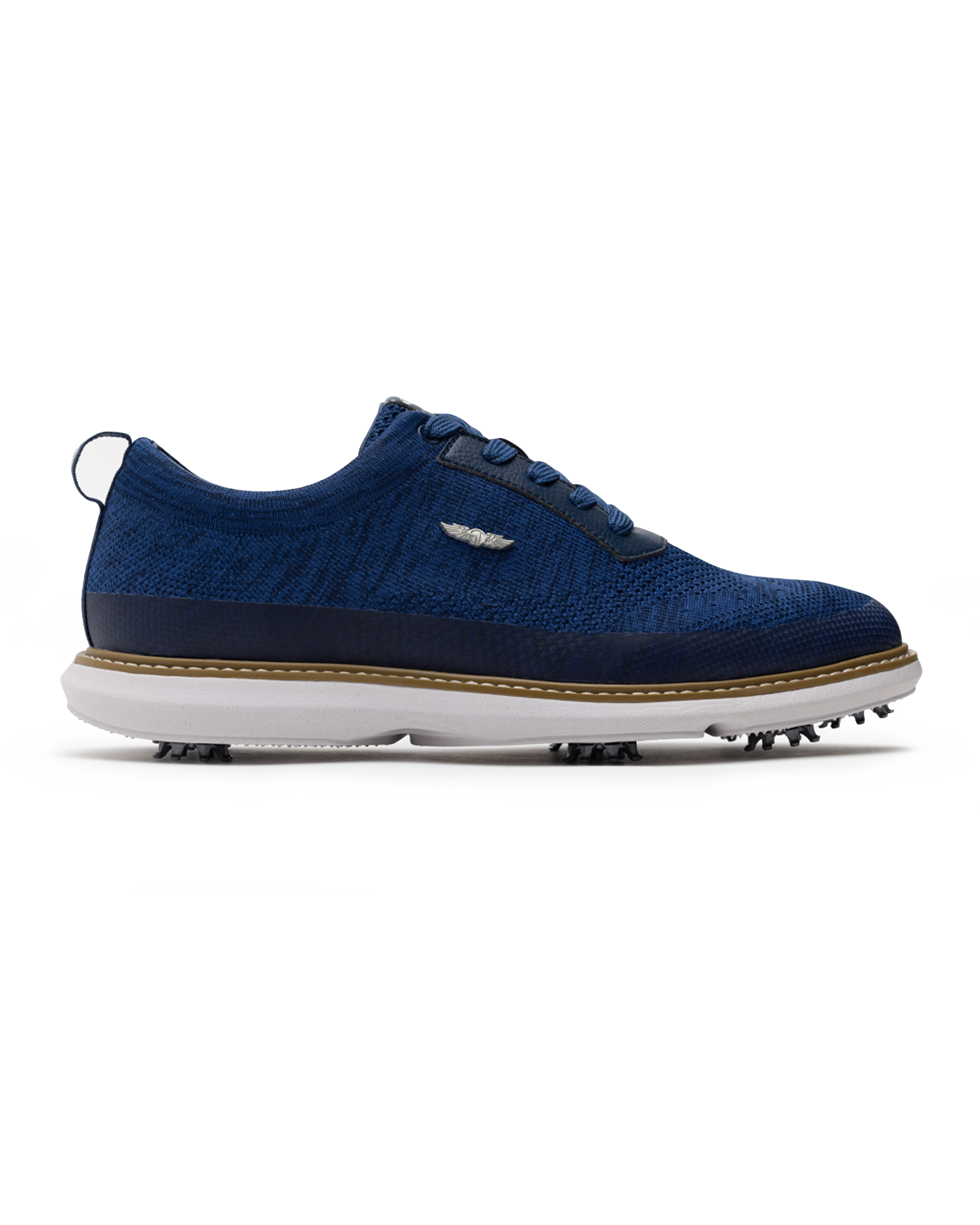 Men's Challenger Shoe in Indigo, side profile view featuring a navy knit upper with navy laces, a silver wing logo badge, navy leather trim, a tan welt stitch detail, white midsole, and spiked outsole