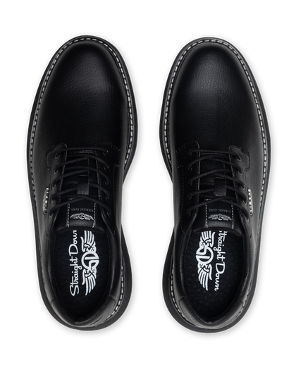 Men's Derby Shoe in Black, top down view of a pair featuring black pebbled leather uppers with black lacing system, contrast stitch midsole trim, and branded Straight Down insoles visible