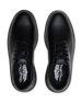 Men's Derby Shoe in Black, top down view of a pair featuring black pebbled leather uppers with black lacing system, contrast stitch midsole trim, and branded Straight Down insoles visible