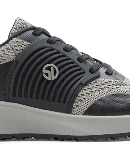 Men's Moonlight V2 Shoe in Black, close-up side view featuring charcoal ribbed rubber overlay with silver Straight Down logo medallion, light grey knit panels, and a white midsole