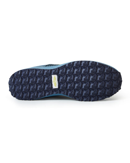 Men's Moonlight V2 Shoe in Deep Sea, bottom view featuring a navy geometric pyramid-textured rubber outsole with a white and gold Straight Down logo badge at the center