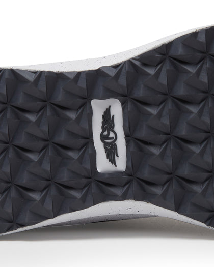 Men's Moonlight V2 Shoe in Granite, close-up detail view of the black pyramid-textured rubber outsole featuring a Straight Down logo tag at the center