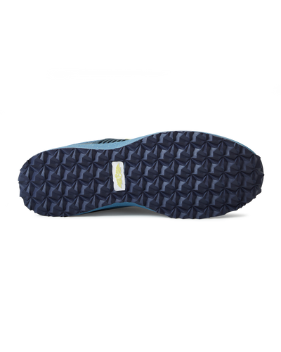 Men's Moonlight V2 Shoe in Deep Sea, bottom view featuring a navy geometric pyramid-textured rubber outsole with a white and gold Straight Down logo badge at the center