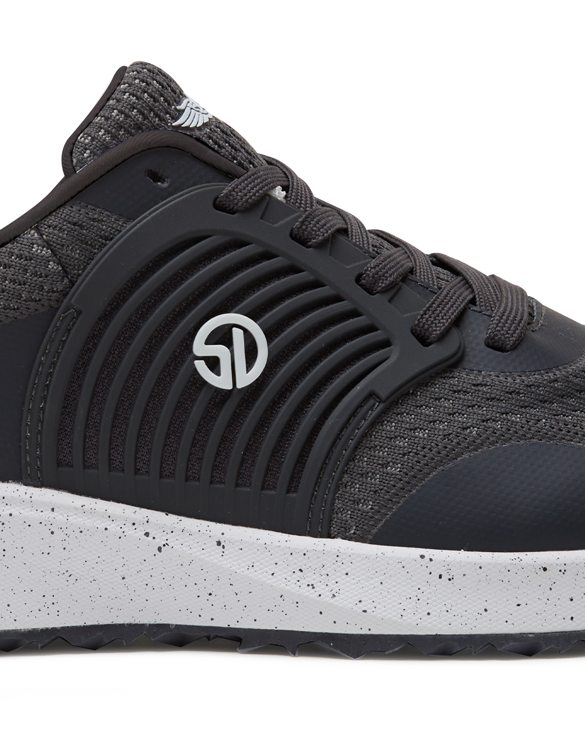 Men's Moonlight V2 Shoe in Granite, close-up detail view highlighting the molded rubber overlay with concentric arc detailing, Straight Down logo badge, charcoal knit texture, and speckled white midsole