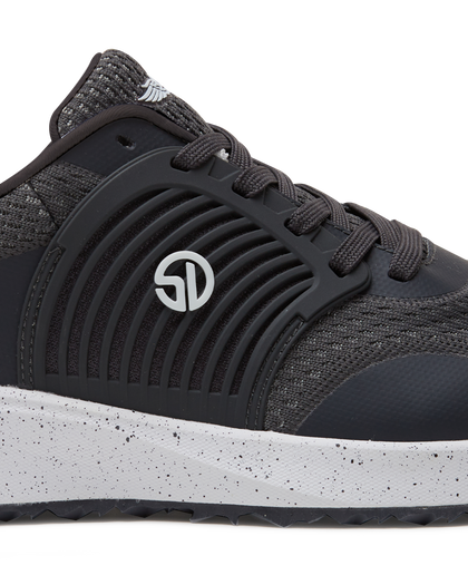 Men's Moonlight V2 Shoe in Granite, close-up detail view highlighting the molded rubber overlay with concentric arc detailing, Straight Down logo badge, charcoal knit texture, and speckled white midsole