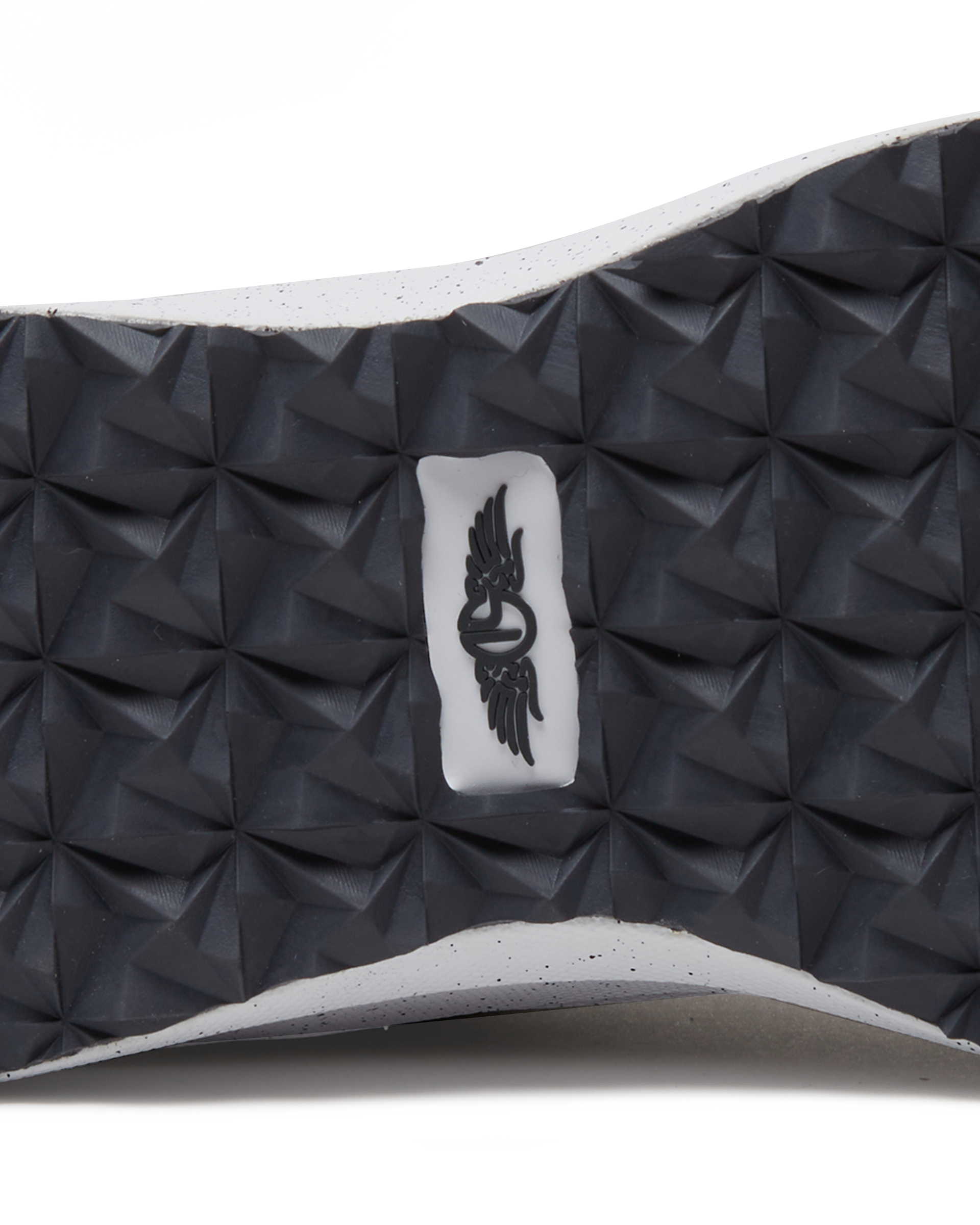 Men's Moonlight V2 Shoe in Granite, close-up detail view of the black pyramid-textured rubber outsole featuring a Straight Down logo tag at the center