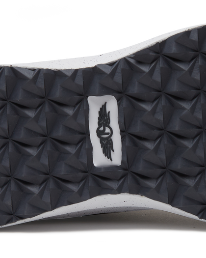 Men's Moonlight V2 Shoe in Granite, close-up detail view of the black pyramid-textured rubber outsole featuring a Straight Down logo tag at the center