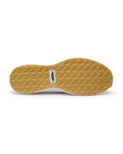 Straight Down Weekender Golf Shoe in Cashew, bottom sole view featuring gum geometric pyramid traction outsole with Straight Down wing logo badge at arch