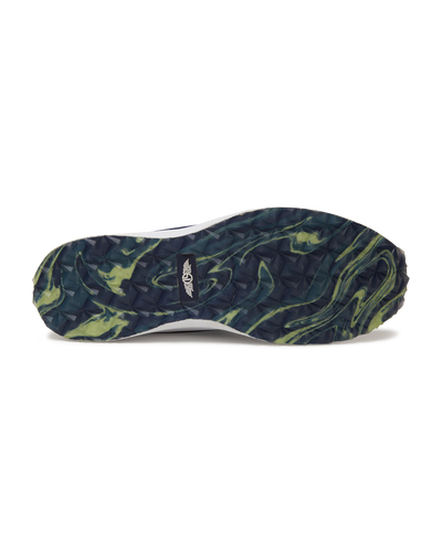 Straight Down Weekender Golf Shoe in New Indigo, bottom sole view featuring navy and yellow marbled geometric pyramid traction outsole with Straight Down wing logo badge at arch