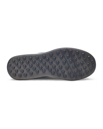 Men's Rally Shoe in Granite, bottom view featuring a dark gray rubber outsole with multi-directional traction rubber studs and flex grooves