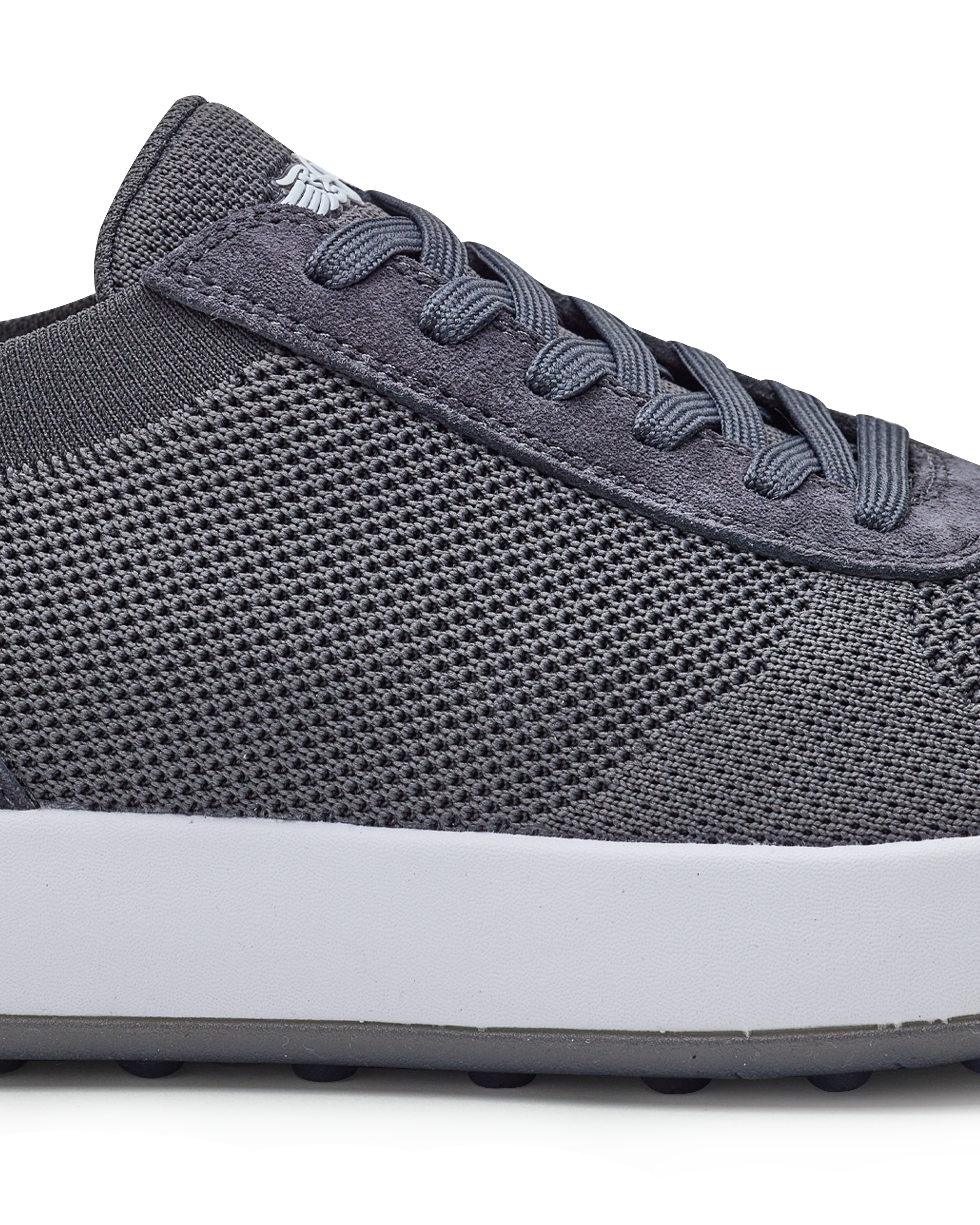 Men's Rally Shoe in Granite, detail close-up view featuring the dark gray knit upper texture, suede overlay at the toe box, lace-up closure, and white midsole with Straight Down logo at tongue