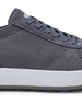 Men's Rally Shoe in Granite, detail close-up view featuring the dark gray knit upper texture, suede overlay at the toe box, lace-up closure, and white midsole with Straight Down logo at tongue