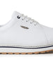 Straight Down Bourbon Hybrid Golf Shoe in White, close-up lateral side detail view featuring white pebbled leather upper, silver Straight Down wing logo badge, navy lace eyelet accents, white laces, white midsole with navy stripe accent, and gum traction outsole