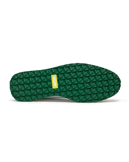 Straight Down Bourbon Hybrid Golf Shoe in White Verde, bottom sole view featuring green geometric pyramid traction outsole with yellow Straight Down wing logo badge at arch
