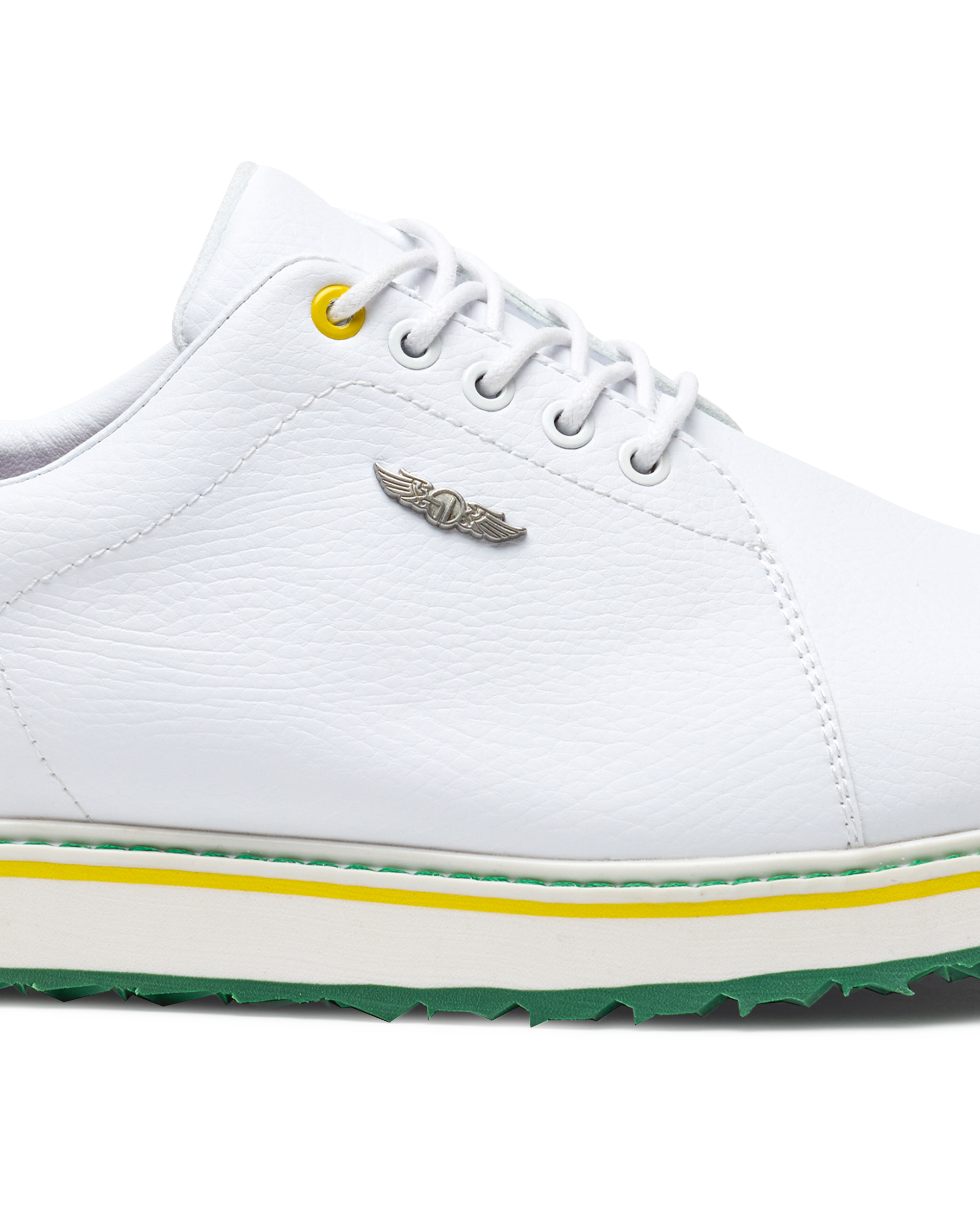 Straight Down Bourbon Hybrid Golf Shoe in White Verde, close-up lateral side detail view featuring white pebbled leather upper, silver Straight Down wing logo badge, yellow lace eyelet accent, white laces, white midsole with yellow and green stripe accents, and green traction outsole