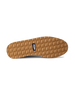 Straight Down Bourbon Hybrid Golf Shoe in White, bottom sole view featuring gum rubber geometric pyramid traction outsole with navy Straight Down wing logo badge at arch