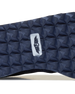 Straight Down Harbour Knit Hybrid Golf Shoe in New Indigo, close-up outsole detail view featuring navy geometric pyramid traction outsole with Straight Down wing logo badge at arch
