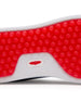 Straight Down Boardwalk Golf Shoe in Federal, close-up outsole detail view featuring solid red circular traction nub outsole with white arch bridge and red Straight Down wing logo badge at center