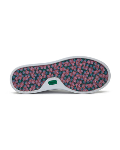 Straight Down Boardwalk Golf Shoe in Verde, bottom sole view featuring floral hibiscus print outsole with circular traction nubs in pink and blue tones and green Straight Down logo badge at arch