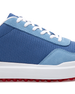 Straight Down Boardwalk Golf Shoe in Federal, close-up lateral side detail view featuring medium blue canvas upper, light blue suede lace overlay and heel panel, white laces, and red traction outsole