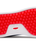 Straight Down Boardwalk Golf Shoe in Federal, close-up outsole detail view featuring solid red circular traction nub outsole with white arch bridge and red Straight Down wing logo badge at center