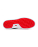 Straight Down Boardwalk Golf Shoe in Federal, bottom sole view featuring solid red circular traction nub outsole with white arch bridge and red Straight Down wing logo badge at center