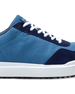 Straight Down Boardwalk Golf Shoe in Petrol, close-up lateral side detail view featuring medium blue canvas upper, navy suede lace overlay and heel panel, white laces, and white outsole